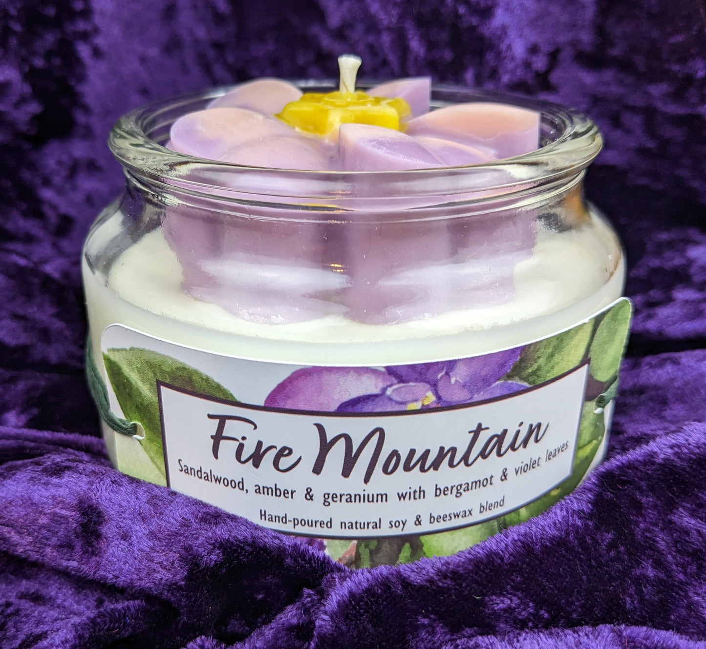 African violet candle purple flower soy and beeswax sandalwood amber geranium bergamot violet leaves